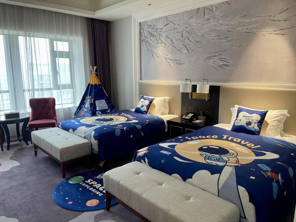 Guangzhou Pan Yu President Hotel : photo 2 de la chambre chambre lits jumeaux spacieuse