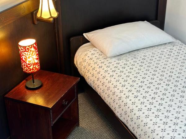 Pensjonat Gogol.s : photo 7 de la chambre chambre quadruple avec salle de bains privative