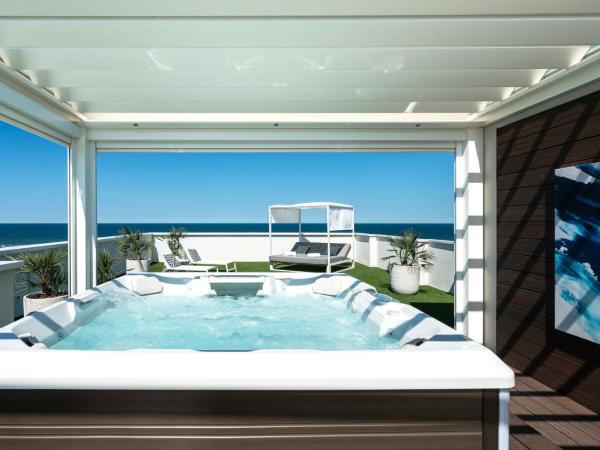 Litoraneo Suite Hotel : photo 2 de la chambre suite lit queen-size deluxe