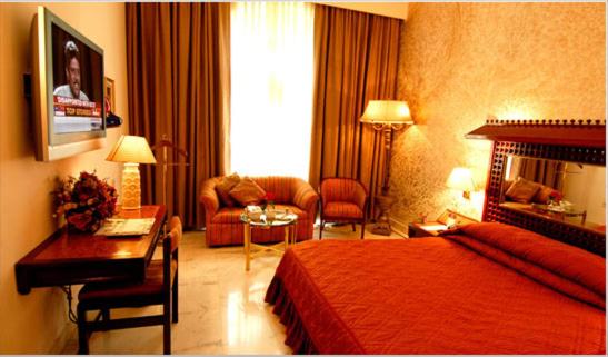 Ashok Country Resort : photo 1 de la chambre chambre double deluxe (2 adultes + 1 enfant)