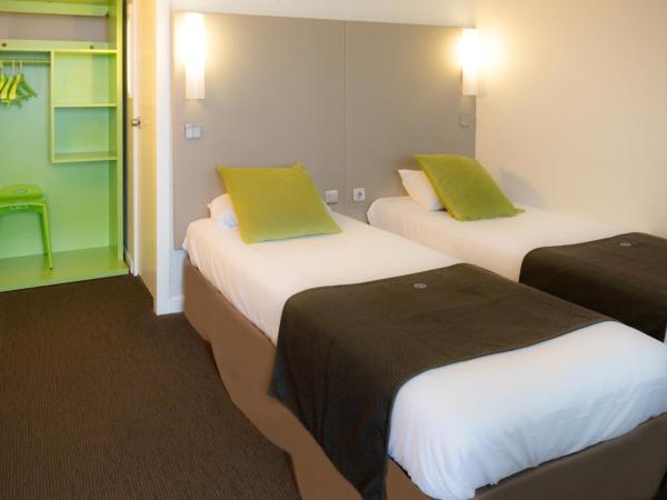 Hotel inn Design Laval : photo 6 de la chambre chambre lits jumeaux