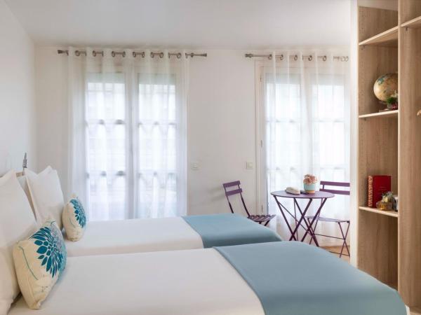 Grand Hotel du Calvados - Opera : photo 2 de la chambre chambre lits jumeaux standard