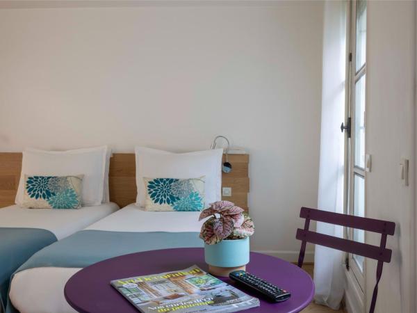 Grand Hotel du Calvados - Opera : photo 6 de la chambre chambre lits jumeaux standard