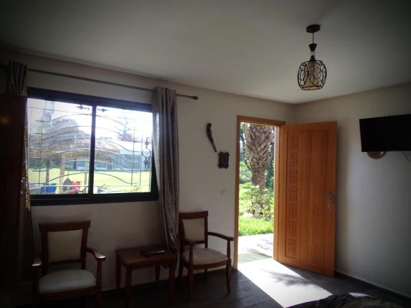 Jnane Ville Verte : photo 1 de la chambre chambre double ou lits jumeaux - vue sur jardin