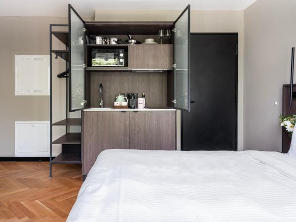 Numa Munich Obersendling : photo 3 de la chambre large studio with kitchenette