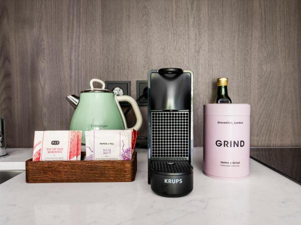 Numa Munich Obersendling : photo 5 de la chambre large studio with kitchenette