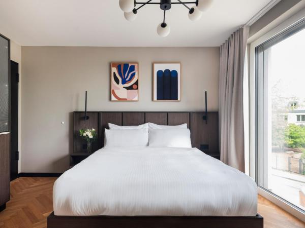 Numa Munich Obersendling : photo 6 de la chambre large studio with kitchenette