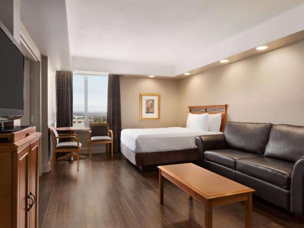 Royal Hotel Calgary, Trademark Collection by Wyndham : photo 1 de la chambre chambre lit king-size deluxe - non-fumeurs 
