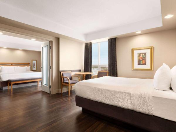 Royal Hotel Calgary, Trademark Collection by Wyndham : photo 1 de la chambre suite familiale 1 chambre avec 1 lit king-size et 1 lit queen-size - non-fumeurs