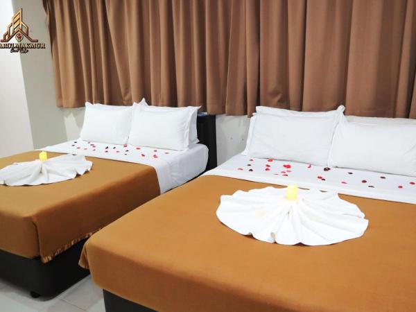 DarulMakmur Scout Lodge : photo 1 de la chambre four beads