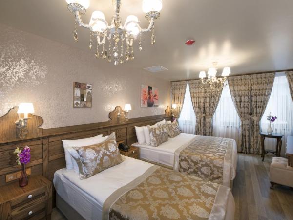 Perapolis Hotel : photo 3 de la chambre chambre triple deluxe