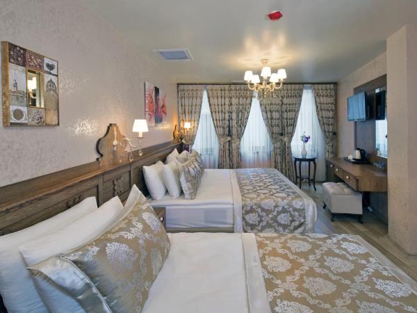 Perapolis Hotel : photo 4 de la chambre chambre triple deluxe