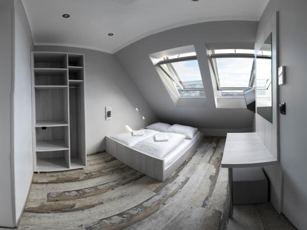 Do Step Inn Meidling - Self-Service-Hotel : photo 2 de la chambre suite standard