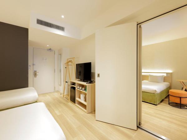 karaksa hotel Sapporo : photo 1 de la chambre chambre communicante (4 adultes)