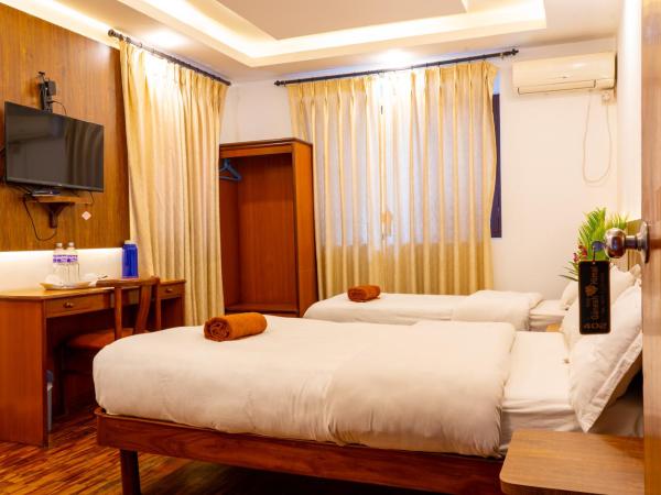 Hotel Ganesh Himal : photo 7 de la chambre chambre deluxe double ou lits jumeaux