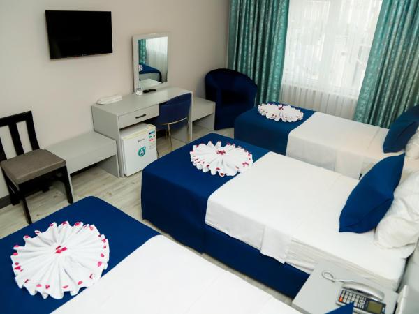 Safari Otel : photo 6 de la chambre chambre triple standard