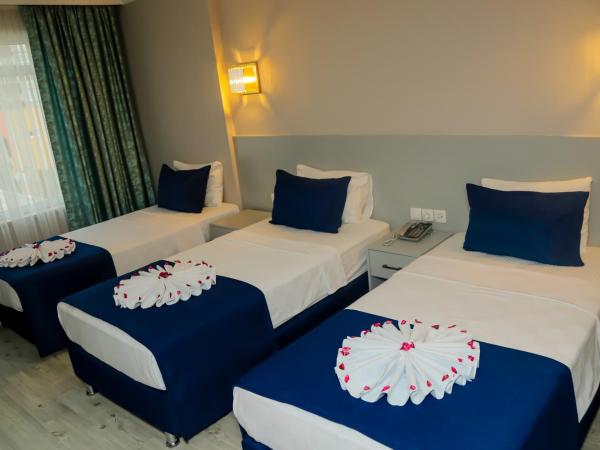 Safari Otel : photo 1 de la chambre chambre triple standard