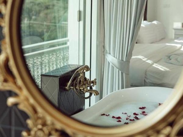 Nidhra Lanna Hotel Chiang Mai : photo 5 de la chambre hébergement deluxe - vue sur montagne