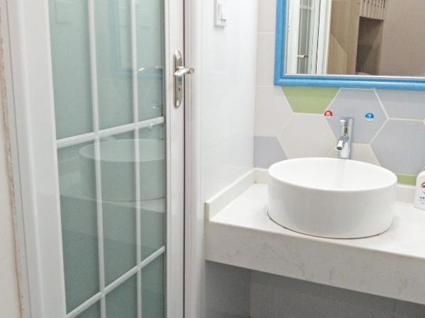 笑脸里青年旅舍锦里店 : photo 7 de la chambre bed in 4-bed female dormitory room - shared bathroom