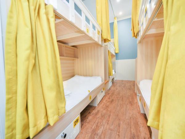 笑脸里青年旅舍锦里店 : photo 5 de la chambre bed in 4-bed female dormitory room - shared bathroom