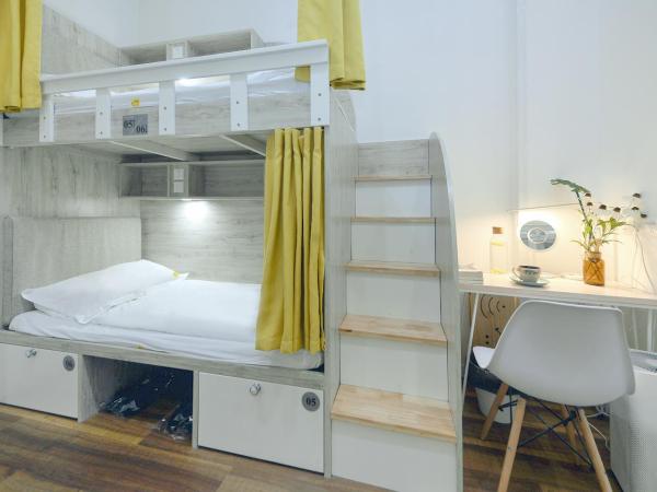 笑脸里青年旅舍宽窄店 : photo 1 de la chambre lit dans dortoir de 8 lits 
