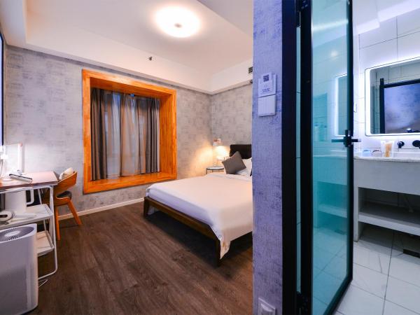 笑脸里青年旅舍天府店 : photo 2 de la chambre chambre lit queen-size deluxe