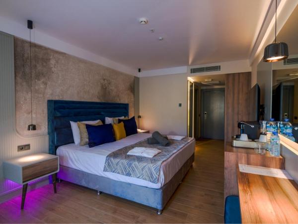 Ada Port Hotel Adults Only : photo 2 de la chambre chambre double - vue sur jardin
