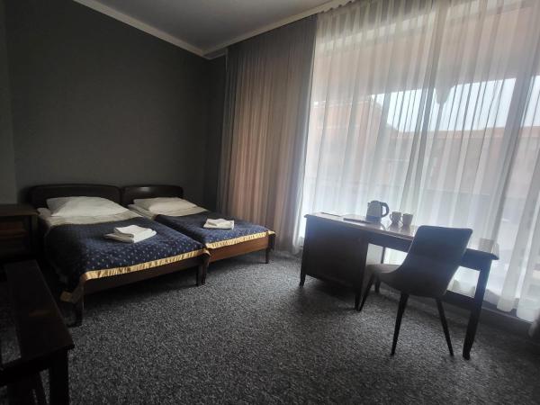 Hostel Bialoleka - Darmowy parking, szybkie Wifi! : photo 3 de la chambre chambre lits jumeaux standard