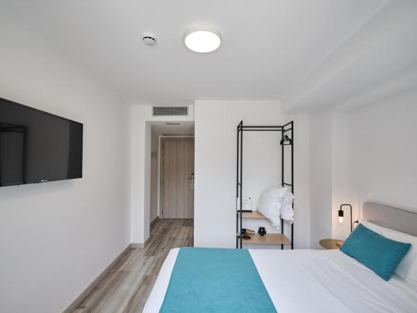 Hotel Pombal Rooms : photo 6 de la chambre chambre double ou lits jumeaux supérieure avec vue sur ville