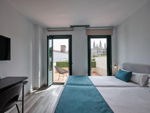 Hotel Pombal Rooms : photo 2 de la chambre chambre lits jumeaux avec terrasse