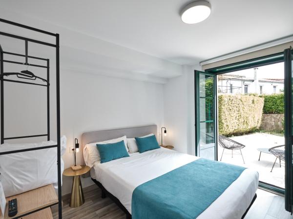 Hotel Pombal Rooms : photo 2 de la chambre chambre double ou lits jumeaux supérieure avec vue sur ville