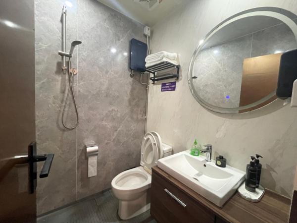 中怡公寓 : photo 4 de la chambre chambre lit king-size