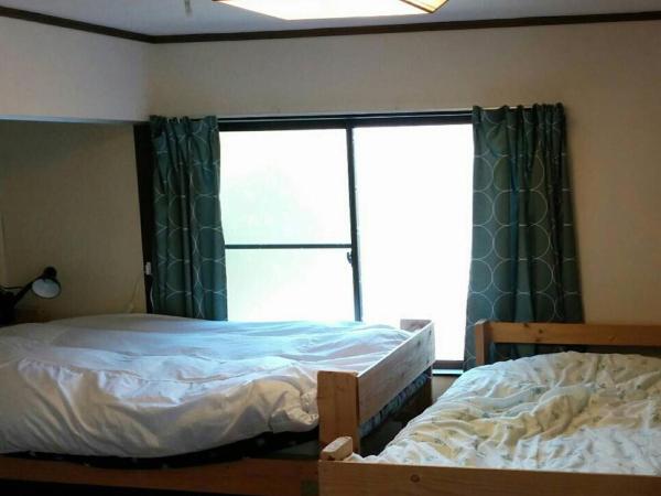 Guesthouse Angoso : photo 1 de la chambre chambre lits jumeaux standard avec salle de bains commune