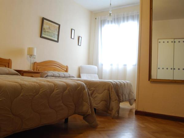 Hostal America : photo 2 de la chambre chambre triple