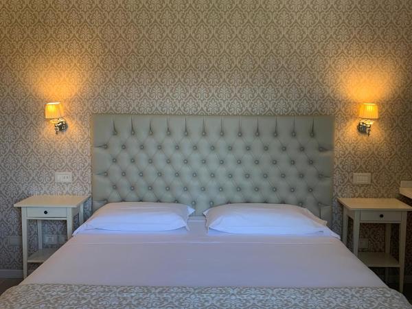 Nuova Opera Rooms : photo 7 de la chambre chambre triple avec balcon