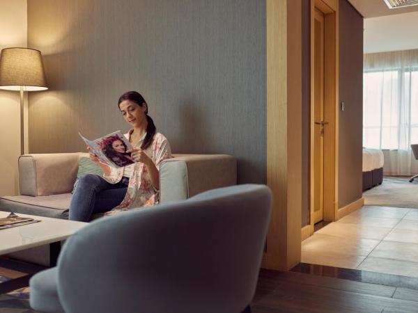 Flora Inn Hotel Dubai Airport : photo 2 de la chambre suite exécutive