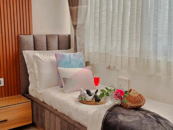Hotel Sarang Palace - Boutique Stays : photo 8 de la chambre premier triple room with daybed