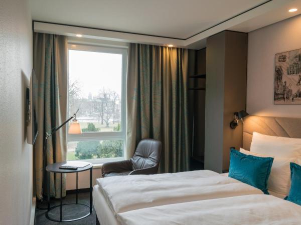 Motel One Dresden - Palaisplatz : photo 9 de la chambre chambre avec lit queen-size