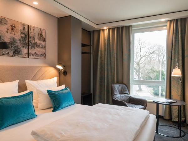 Motel One Dresden - Palaisplatz : photo 8 de la chambre chambre lit king-size