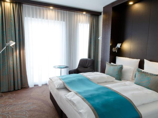 Motel One Stuttgart-Bad Cannstatt : photo 9 de la chambre chambre lit king-size