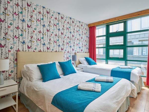 Abigail's Hostel : photo 1 de la chambre chambre lits jumeaux avec salle de bains privative