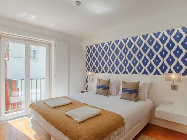 Dear Lisbon - Charming House : photo 1 de la chambre chambre double ou lits jumeaux - vue sur jardin