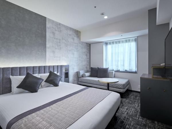 Hotel Villa Fontaine Grand Tokyo-Shiodome : photo 1 de la chambre hébergement lit queen-size supérieur pour 3 personnes - non-fumeurs