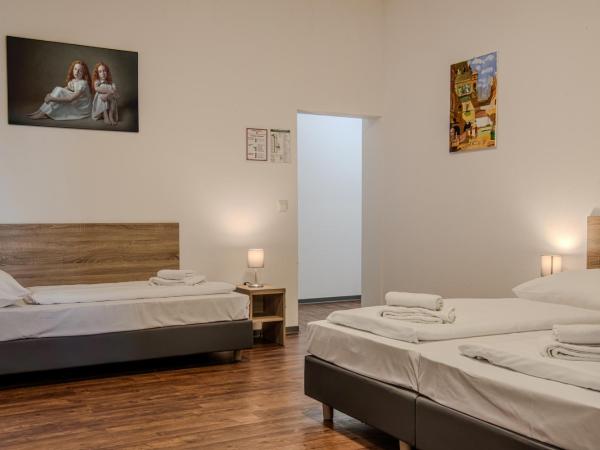 Queens Residenz : photo 2 de la chambre chambre triple