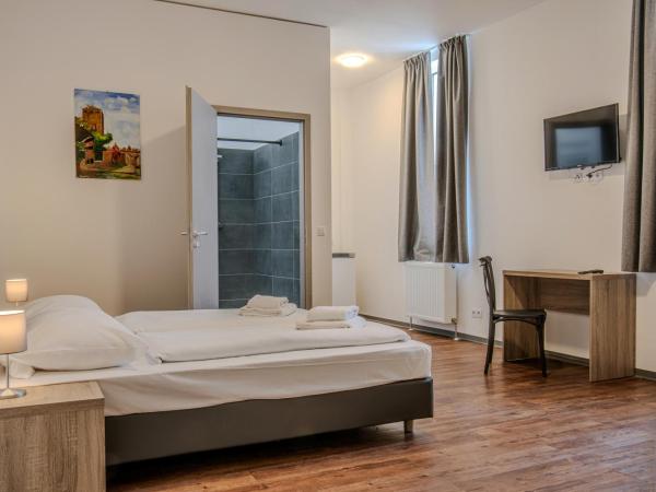 Queens Residenz : photo 3 de la chambre chambre triple