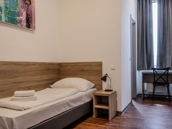 Queens Residenz : photo 1 de la chambre chambre simple