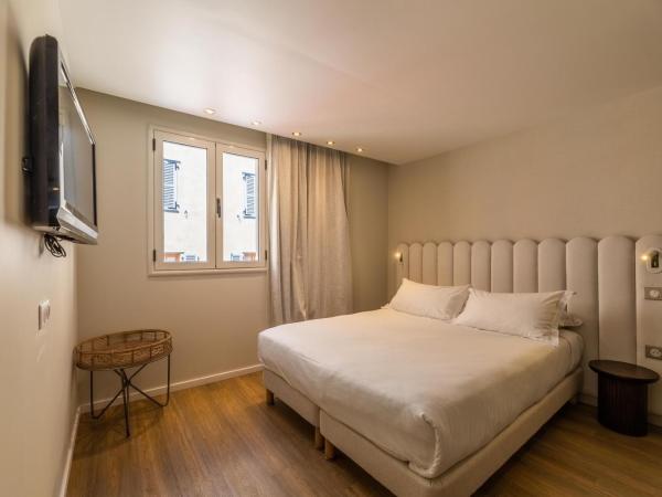 L'Escale Côté Sud : photo 9 de la chambre chambre double - côté sud avec vue sur la ville