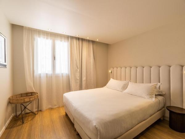 L'Escale Côté Sud : photo 8 de la chambre chambre double - côté sud avec vue sur la ville