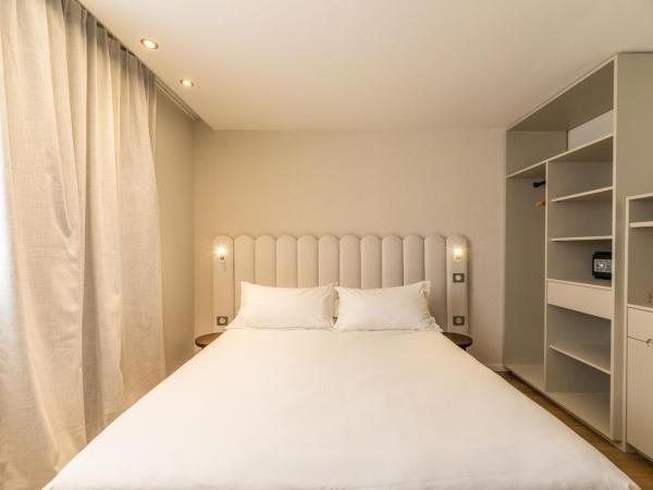 L'Escale Côté Sud : photo 10 de la chambre chambre double - côté sud avec vue sur la ville