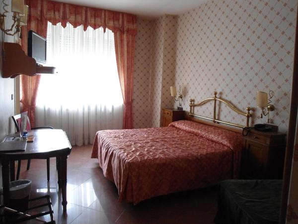 Hotel Continental : photo 2 de la chambre chambre double ou lits jumeaux